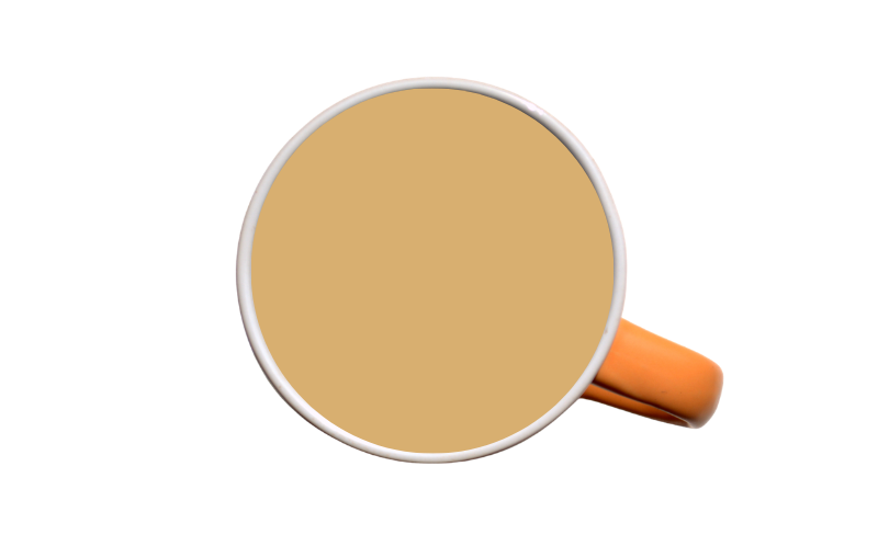 Balanced Blend A cup of coffee with cream in a mug with an orange handle.