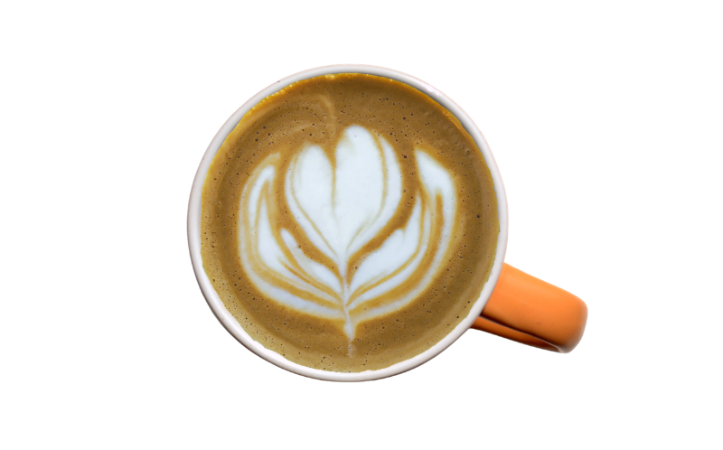Crafted Latte A Latte with a heart design in the foam in a mug with an orange handle.
