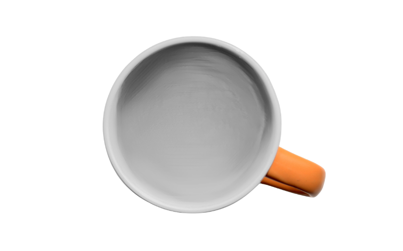 Instant Coffee Cup A cup of black coffee in a mug with an orange handle.