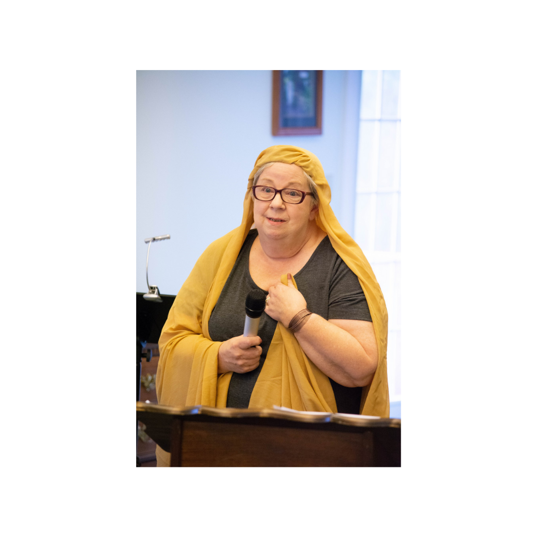 mary-moss=woman-at-the-well-presentation Mary Moss portraying the Woman At The Well during a presentation.